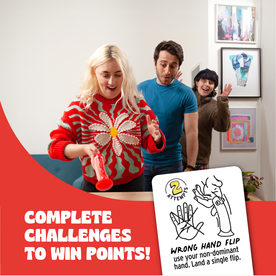 Three people standing indoors, playing Chicken vs Hotdog. A white game card showing hand-flipping instructions is overlaid in the lower right, and large red text on the left reads 'COMPLETE CHALLENGES TO WIN POINTS!'.