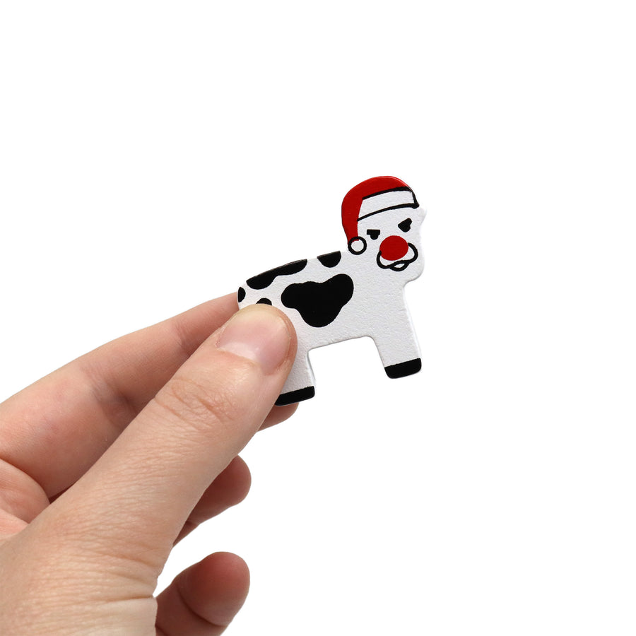 HM Xmas Booster_MOODOLPH COW IN HAND.jpg__PID:742961c4-72c9-4710-af04-f8ef5715c76d